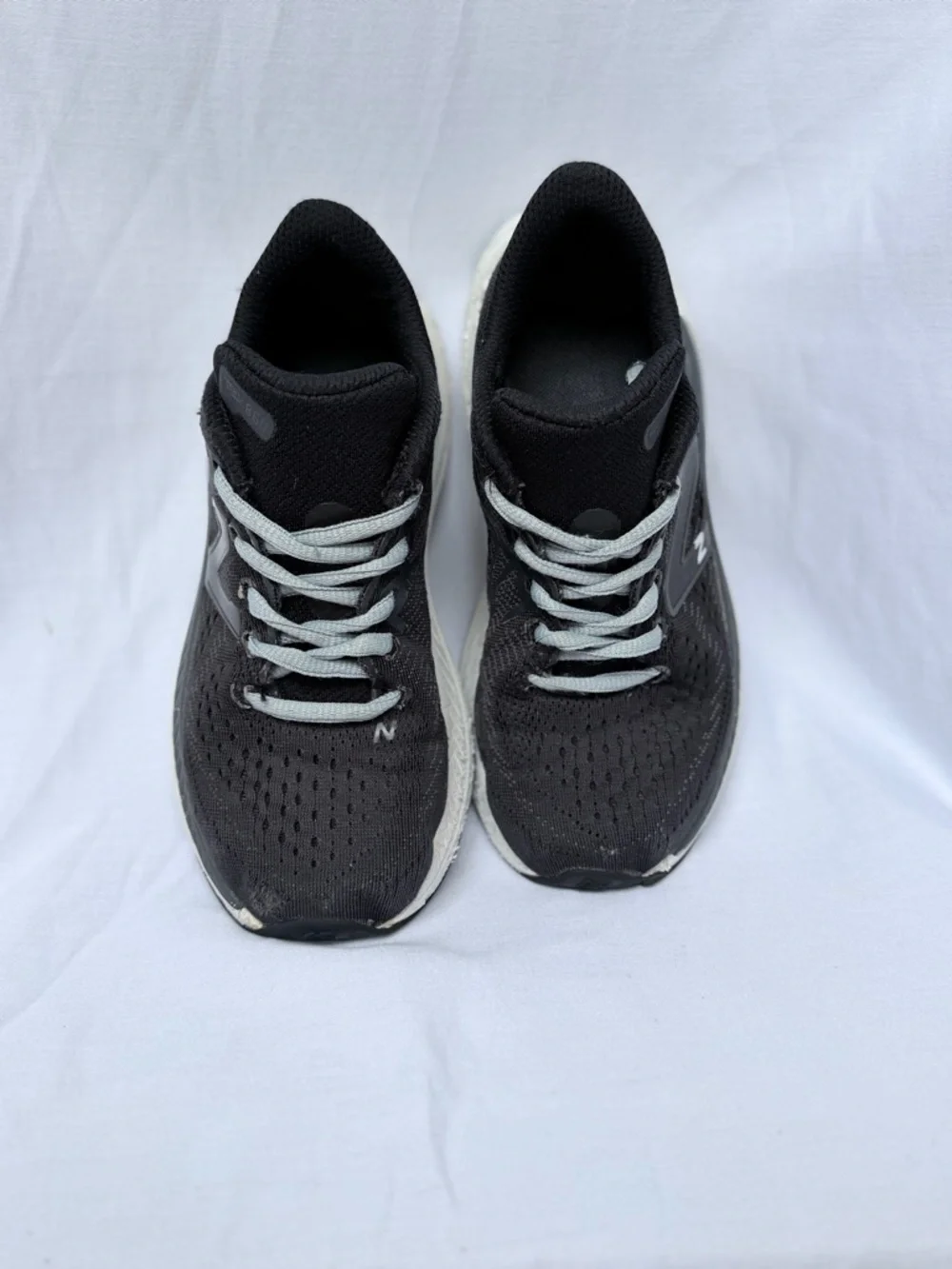 New Balance Black Sneakers with Light Blue Laces